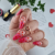 top hybrydowy z czerwonymi serduszkami 10 ml, YOSHI Pure Love Top RED, transparentny top z efektem dekoracyjnym, romantyczny manicure hybrydowy, szybkie zdobienia paznokci topem