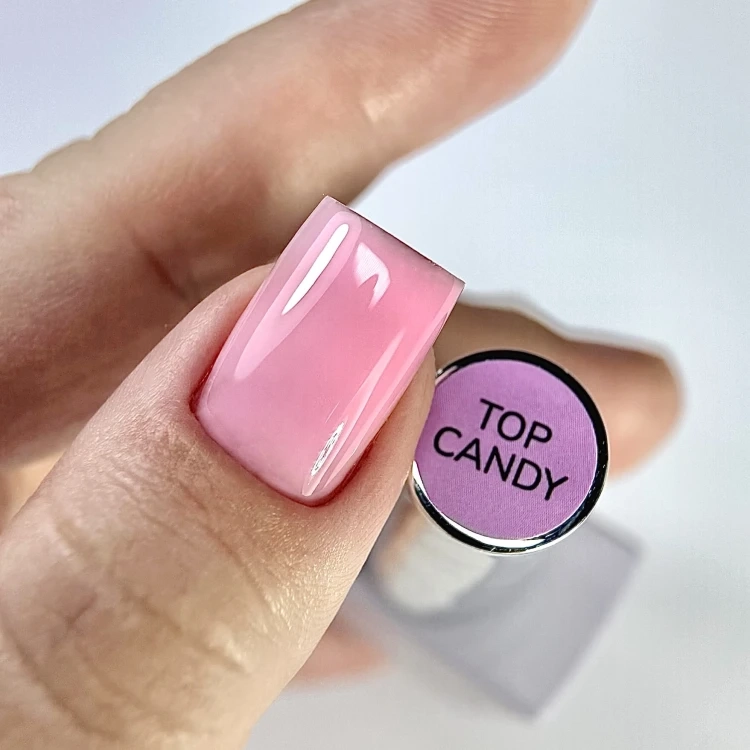 DIVNA Top Candy 13 ml, kolorowy top hybrydowy, top no wipe DIVNA, top do zdobień paznokci, błyszczący top hybrydowy, top samopoziomujący, trwały top do manicure hybrydowego, kolorowy top do paznokci bez przemywania.