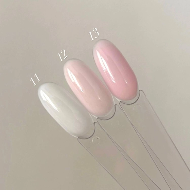 DIVNA Balmy Gel 12 13 ml, żel wzmacniający do paznokci, żel o konsystencji bazy, mleczny róż żel do paznokci, Balmy Gel DIVNA, samopoziomujący żel do naturalnej płytki, HEMA TPO FREE żel, żel w butelce do wzmacniania paznokci.