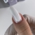 DIVNA Ultra White 7 ml, biały lakier hybrydowy, śnieżnobiały lakier do paznokci, intensywna biel na paznokcie, lakier hybrydowy bez smug, wysoko napigmentowany biały lakier hybrydowy, profesjonalny lakier hybrydowy DIVNA, biały manicure hybrydowy.