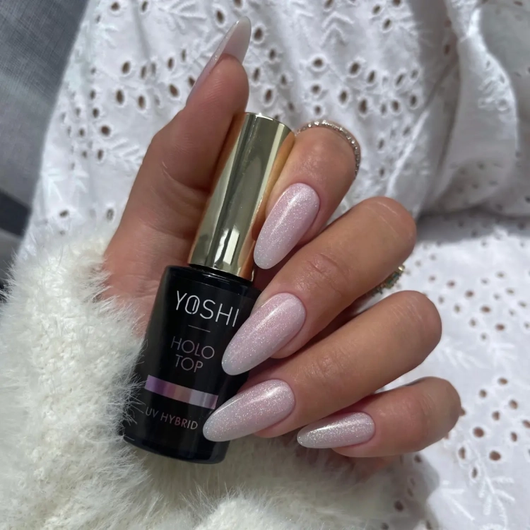 Yoshi Top Holo 10 ml — butelka w dłoni